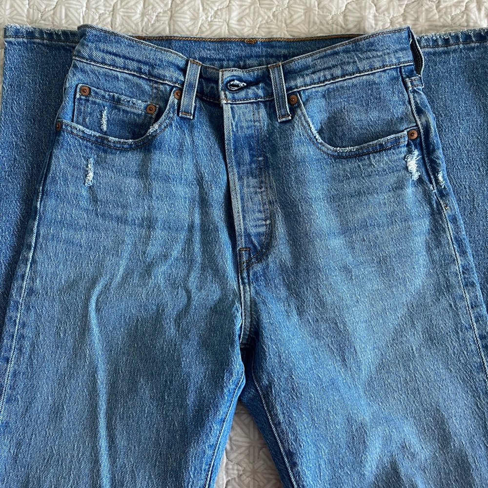 Blue Ripped Levi Jeans